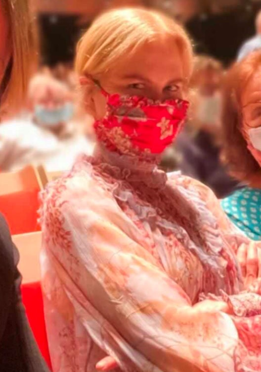 WHO IS THAT MASKED WOMAN?